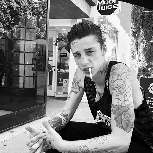 young man, people, the guy with the tattoo, a man with a tattoo, the young man tattooed with cigarettes