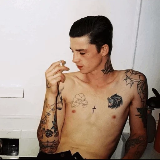 tattoo boy, the tattoo of a skinny guy, a man's tattoo, the guy with the tattoo, tattoos of young people