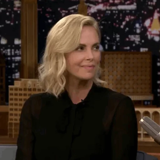 lente de filme, charlize theron, sarah woodward, jimmy fallon, hoje à noite