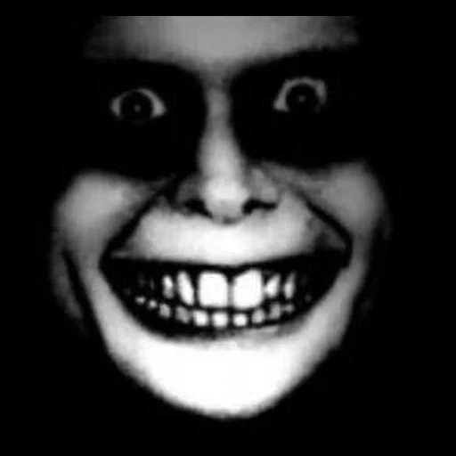 screamer, screaming face, the screams are scary, a terrible smile at the darkness, a scary smile on a black background