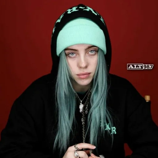 billy ailish, billie eilish, billy eilish taglio di capelli, i capelli di billy alish sono fluenti, billy ailish dai capelli turchesi