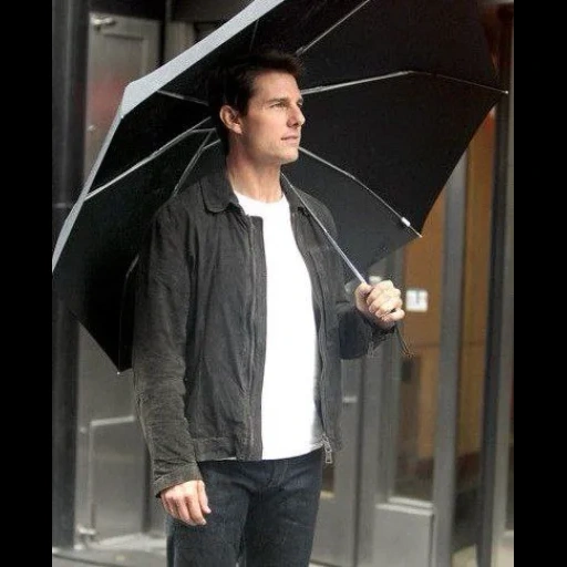 tom cruise, un homme avec un parapluie, style tom cruise, tom cruise de la vie, acteurs hollywoodiens