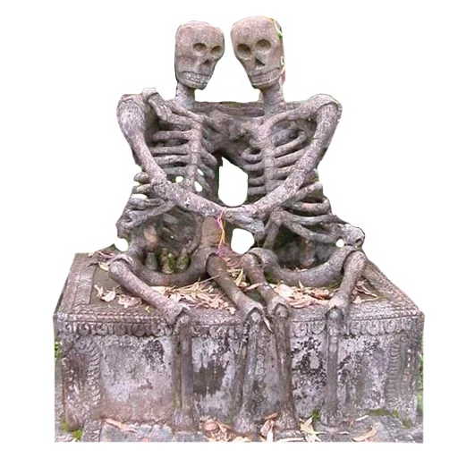 a figurine, gargoyle, skull statue, skeleton figurine, skeleton sculpture