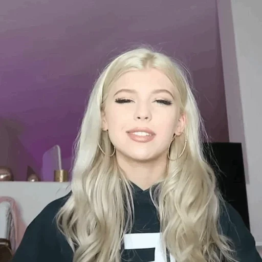 young woman, blonde, tiktok blonde, loren gray musically, fashion piercing of the nose 2020