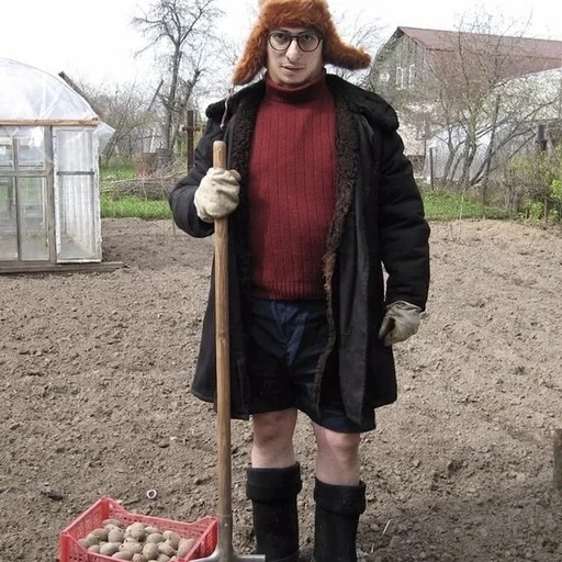 giardino del giardino, un giardino da uomo, è ora di piantare patate, pianta patate di stivali, e che è tempo di piantare patate