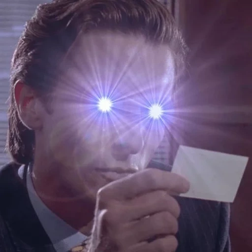 people, the light of eyes, glare from car headlights, patrick bateman films, a man with burning eyes