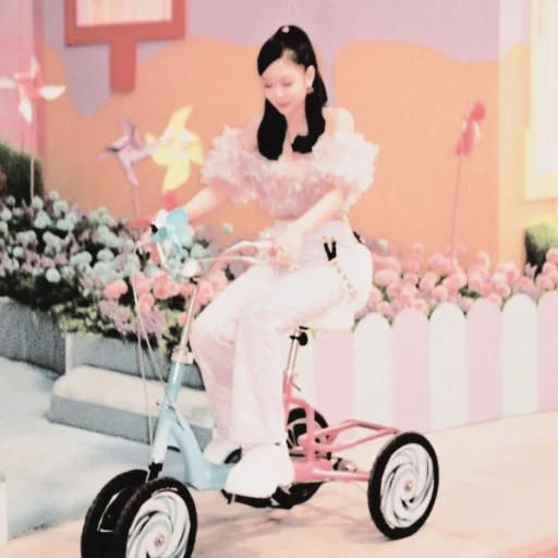 an adult bicycle, small bike, the bicycle is three wheeled, electric bycicle, children's three wheeled bicycle