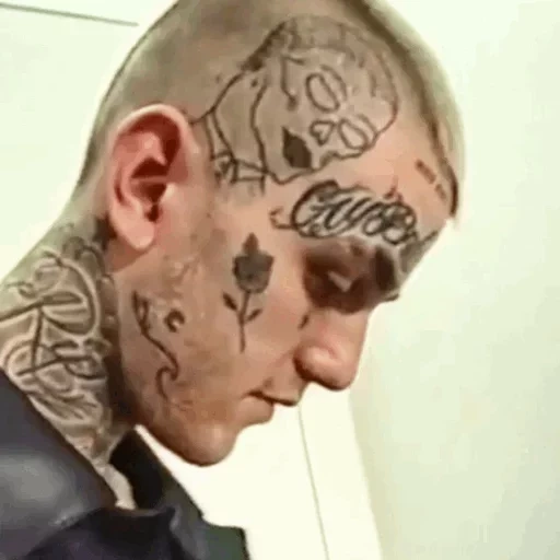 the male, human, shock tattoo face, tattoos to the head, tattoo face male