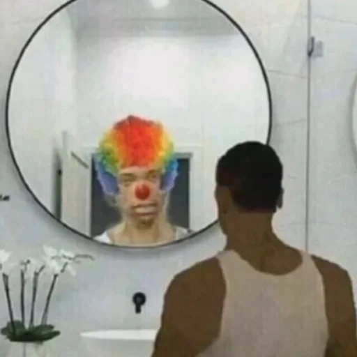 clown, smiling face, clown mirror, look in the mirror, the clown looks in the mirror