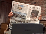 newspaper, hand newspaper, in the photo in the newspaper